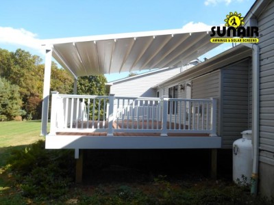 Pergola%20awning%20mounted%20on%20the%20roof%20and%20deck.JPG